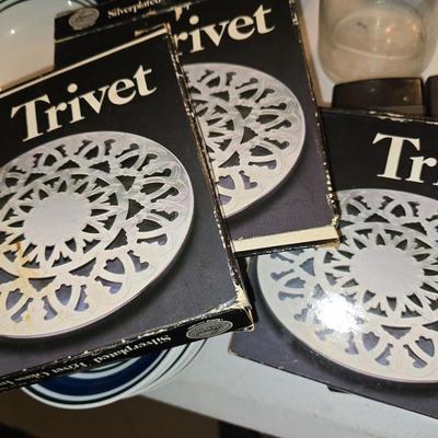 3 silver plated trivets with boxes