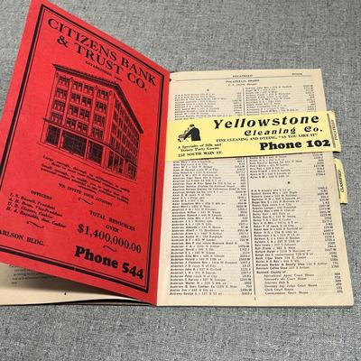 Sale Photo Thumbnail #92: Own a rare piece of American communication history with this authentic 1928–1929 Telephone Directory from Pocatello and American Falls, Idaho.