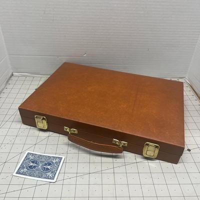 Sale Photo Thumbnail #1263: Enjoy timeless strategy with this vintage wood and cork backgammon set, featuring a folding wooden case lined with a cork playing surface for smooth, quiet gameplay.