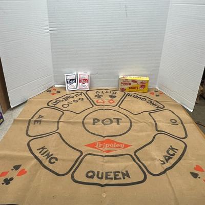 Sale Photo Thumbnail #1303: A deluxe version of the timeless family favorite, this edition features a vibrant canvas game mat, high-quality playing chips, and a deck of cards.