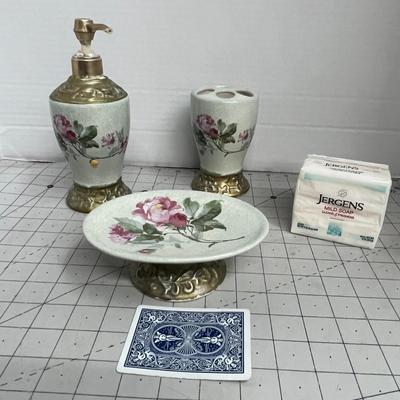 Sale Photo Thumbnail #1491: Elegant 3-piece ceramic bath set with rose design and gold accents.
