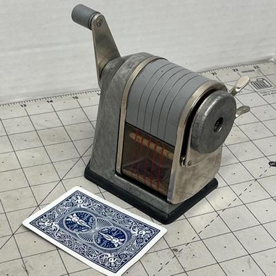 Sale Photo Thumbnail #1774: Classic Apsco Premier 50 sharpener with a pack of wooden pencils for timeless utility.