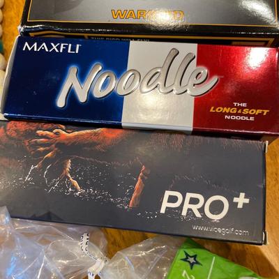 Golf balls and tees