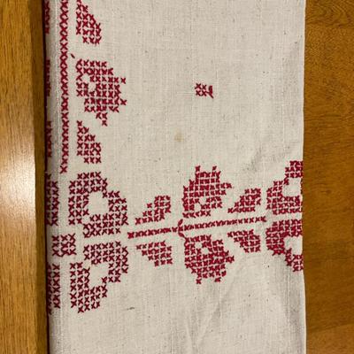 Ceramic wall plaque & red embroidered table cloths