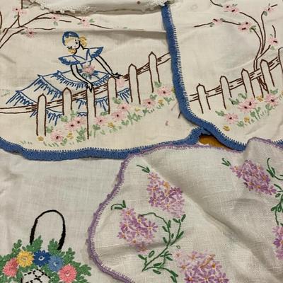 Embroidered ladies and other doilies