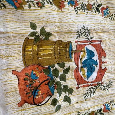 Knitted pot holders, embroidered table cloths and dish cloth