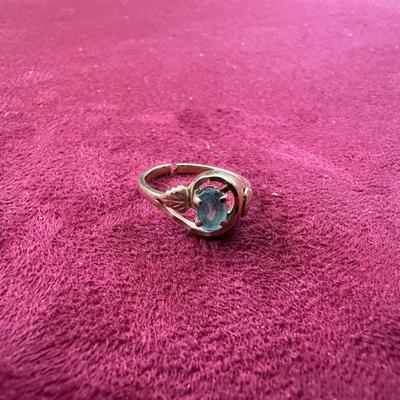 12K LADIES RING WITH LIGHT BLUE STONE
