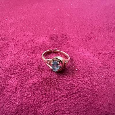 12K LADIES RING WITH LIGHT BLUE STONE