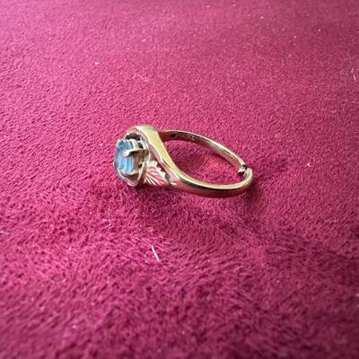 12K LADIES RING WITH LIGHT BLUE STONE