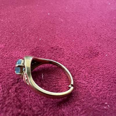 12K LADIES RING WITH LIGHT BLUE STONE