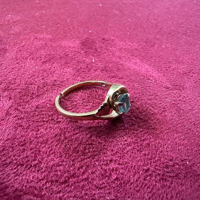 12K LADIES RING WITH LIGHT BLUE STONE
