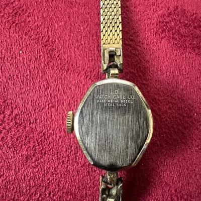Sale Photo Thumbnail #56: Watch band is stamped 1/20 10K.G.F.