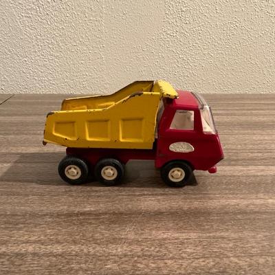 TONKA WRECKER/TOW TRUCK AND A TONKA DUMP TRUCK