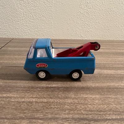 TONKA WRECKER/TOW TRUCK AND A TONKA DUMP TRUCK