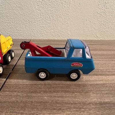TONKA WRECKER/TOW TRUCK AND A TONKA DUMP TRUCK