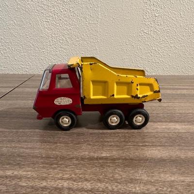 TONKA WRECKER/TOW TRUCK AND A TONKA DUMP TRUCK