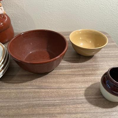 STONEWARE DISHES, CLAY BOWLS AND A MONK COOKIE JAR