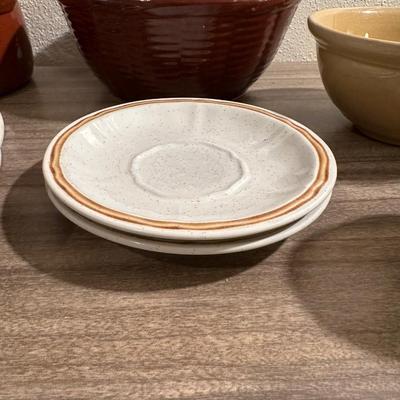 STONEWARE DISHES, CLAY BOWLS AND A MONK COOKIE JAR
