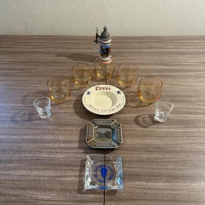 COORS, FORT BENNING & IRISH ASHTRAYS, SMALLER STEIN, SHOT GLASSES AND DRINKING GLASES