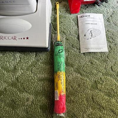 RICCAR VIBRANCE UPRIGHT VACUUM AND A ROYAL HAND VACUUM