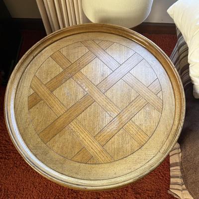 Sale Photo Thumbnail #19: This antique Baker side table features a Country French style with a warm, rich oak finish. It includes a parquet top design, cabriole legs, and a pull-out drawer, making it a functional addition to living rooms or bedrooms. The table is original and has 