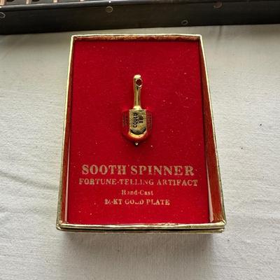 24-KT GOLD PLATED SOOTHE SPINNER (FORTUNE TELLING ARTIFACT) THE ADULT GAME "THINK" AND AN ABACUS