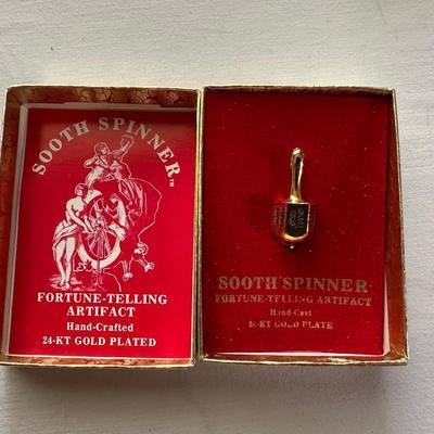 24-KT GOLD PLATED SOOTHE SPINNER (FORTUNE TELLING ARTIFACT) THE ADULT GAME "THINK" AND AN ABACUS