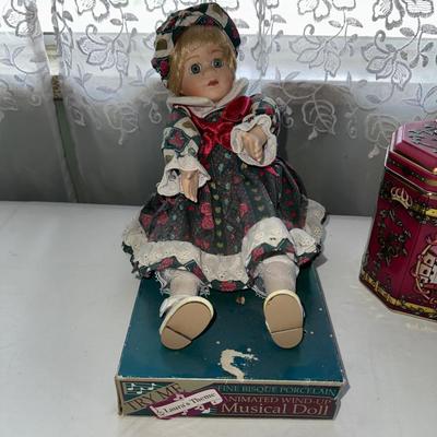 Sale Photo Thumbnail #756: Musical Doll sits 9” Tall