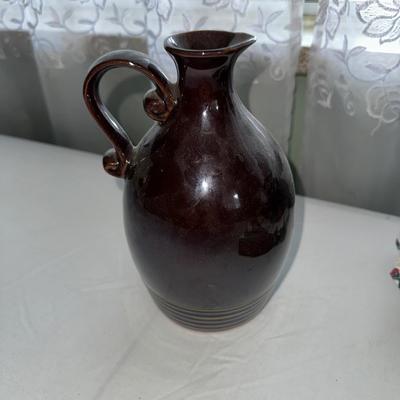 MUSICAL LITTLE BROWN JUG, DOLL AND METAL TIN