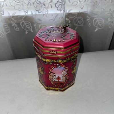 MUSICAL LITTLE BROWN JUG, DOLL AND METAL TIN