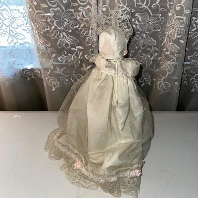3 SMALLER DOLLS PLUS A WICKER DOLL CHAIR