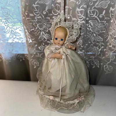 3 SMALLER DOLLS PLUS A WICKER DOLL CHAIR