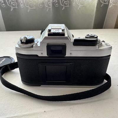 NIKON 35MM CAMERA AND ARGO FLEX BOX CAMERA