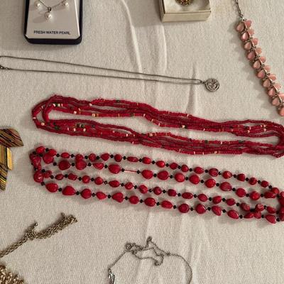 A VARIETY OF COSTUME JEWELRY