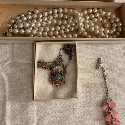 A VARIETY OF COSTUME JEWELRY