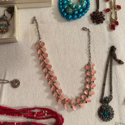 A VARIETY OF COSTUME JEWELRY