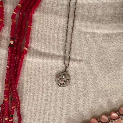 A VARIETY OF COSTUME JEWELRY