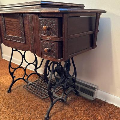 BRUNSWICK TREADLE SEWING MACHINE IN CABINET