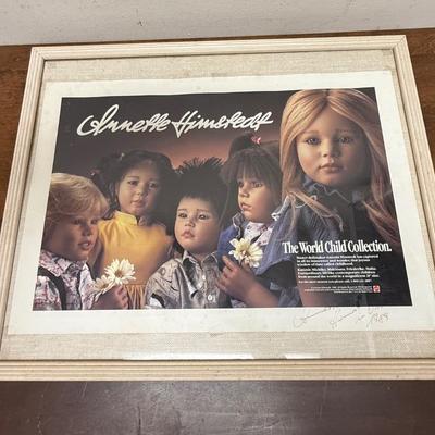 Sale Photo Thumbnail #192: Advertising poster from 1988 showing Mattel Dolls designed bye Annette Himstedt.  Signed in ink by the designer in 1989.  Poster has been framed.  Overall size is approx. 18" x 22".