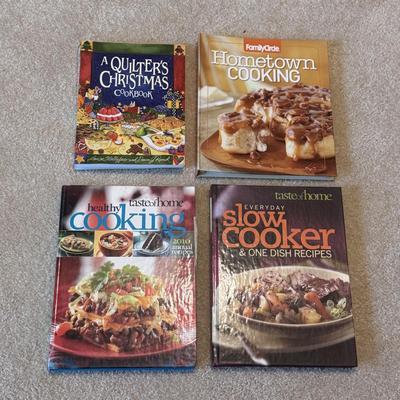 Several Cookbooks, Tea Towels, and Aprons (LR-DZ)