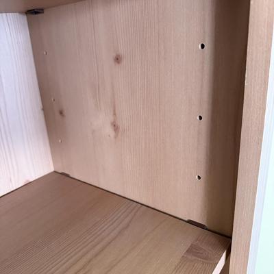 Sale Photo Thumbnail #55: This 5-shelf tall bookcase is a contemporary, free-standing unit designed for home office or study use. It features a brown laminated finish and is constructed from particle board. The bookcase stands 80 inches tall, 30 inches long, and 12 inches wide, of