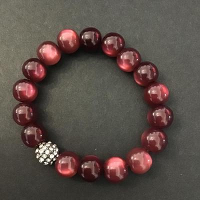 Vintage plum purple moon glow beads stretch purple beaded bracelet