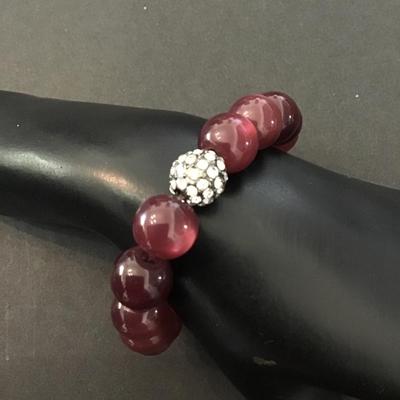 Vintage plum purple moon glow beads stretch purple beaded bracelet