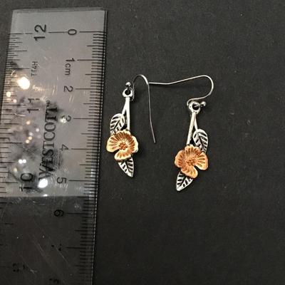 Silver toned dangle earrings