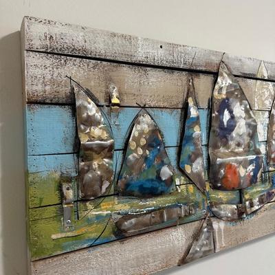 Sale Photo Thumbnail #34: Abstract Sailboat Mixed Media Wall Art.

Dimensions: 21.5” x 72” x 3” deep
