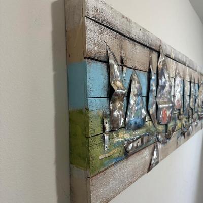 Sale Photo Thumbnail #33: Abstract Sailboat Mixed Media Wall Art.

Dimensions: 21.5” x 72” x 3” deep
