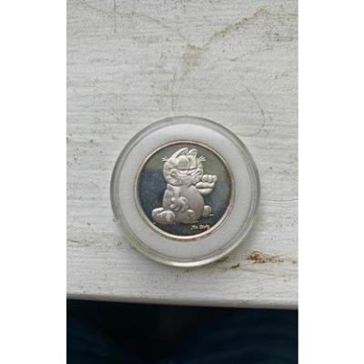 45 collectable coins; rare garfield coin