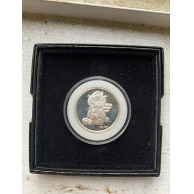 45 collectable coins; rare garfield coin