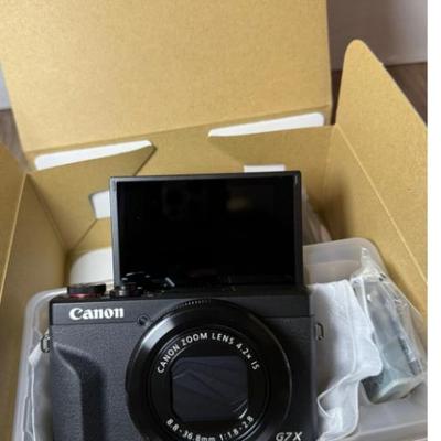 Sale Photo Thumbnail #117: Brand new in box! The viral Canon content creator cam. This camera has been widely sought out all over the country and sells out very quickly. 

Capture unforgettable moments with the Brand New Canon Powershot G7 X Mark III in sleek black. This cutting-ed