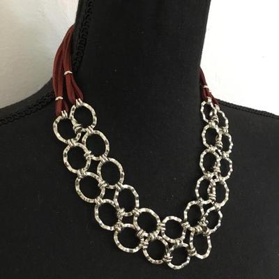 Very nice silver tone, leather type statement, necklace